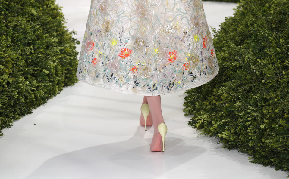 A model presents a creation by Raf Simons for Christian Dior's Spring Summer 2013 Haute Couture fashion collection, presented in Paris, Monday, Jan.21, 2013. (AP Photo/Christophe Ena)