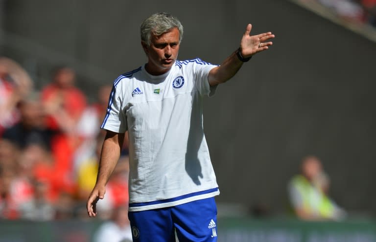 Chelsea's Portuguese manager Jose Mourinho signals during the FA Community Shield match at Wembley Stadium in north London on August 2, 2015