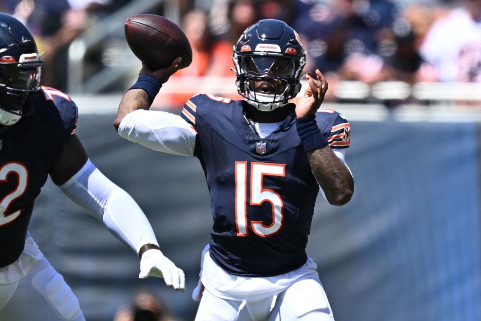 Chicago Bears quarterback P.J. Walker (15) passes against the Tennessee Titans in the first half at Soldier Field.