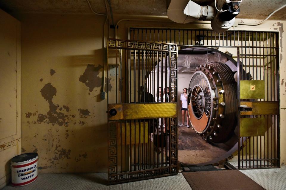 A tour group from The Bolles School looks at an underground vault in Jacksonville in 2019. The students were taking a tour that included a tunnel under Downtown streets dating back more than 100 years that banks used to move funds back and forth.