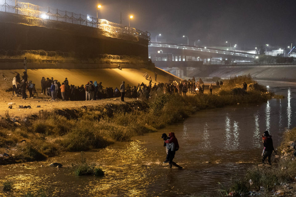 Immigrants cross the Rio Grande into El Paso, Texas to seek political asylum on December 19, 2022 as seen from Ciudad Juarez, Mexico.