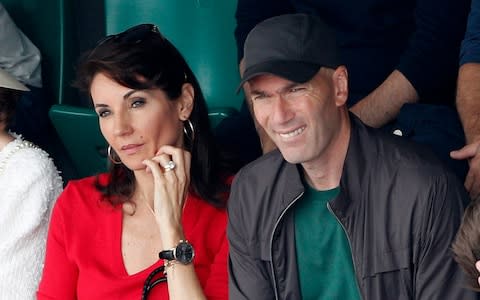 Zinedine Zidane watches on from the stands - Credit: AP