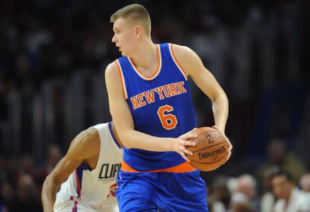 March 11, 2016; Los Angeles, CA, USA; New York Knicks forward Kristaps Porzingis (6) controls the ball against Los Angeles Clippers during the second half at Staples Center. Mandatory Credit: Gary A. Vasquez-USA TODAY Sports / Reuters