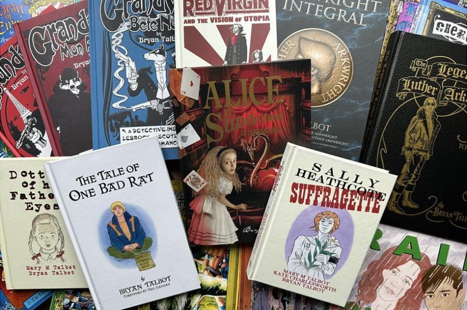 An array of books spread out on a table