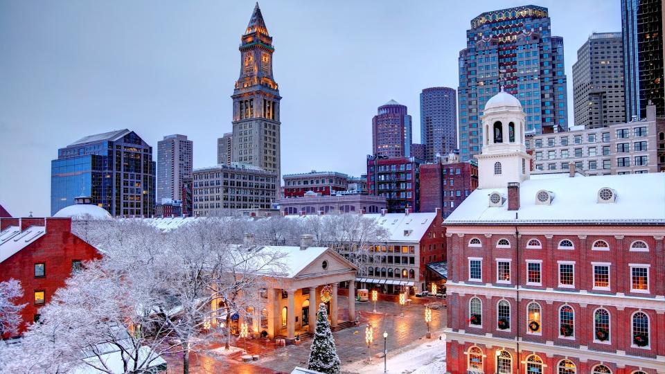 Faneuil Hall rooftops covered in snow during the winter season in Boston.