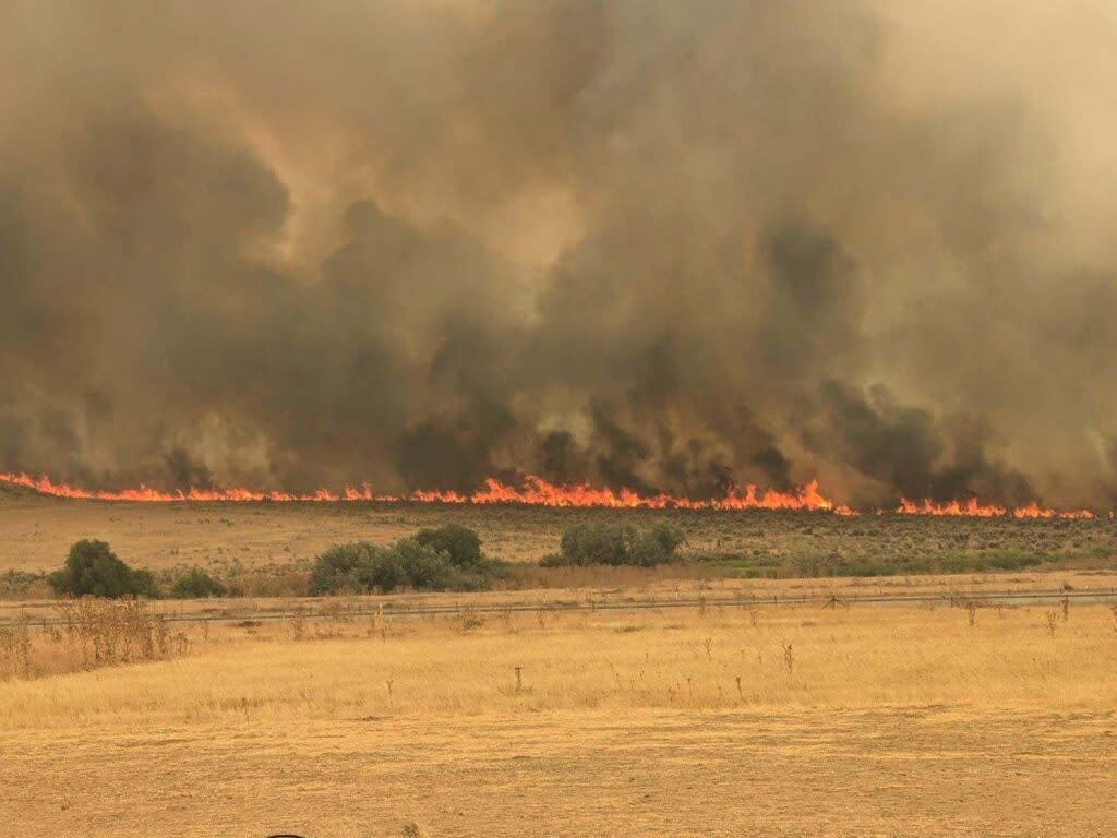 The Durkee Fire in eastern Oregon near the Idaho border burns near the Huntington exit on Interstate 84 on Tuesday, July 23, 2024. (Mike Maguire/Northwest Fire Team 6)