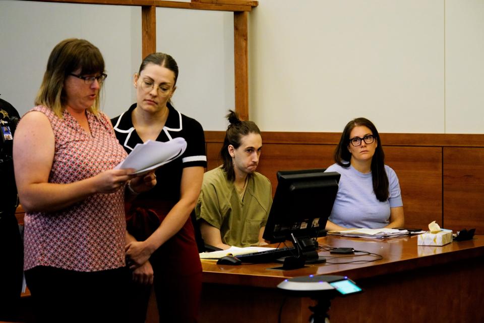 Amanda Simpson, left, speaks in Franklin County Common Pleas Court on Tuesday, July 11, 2023, at the sentencing of her 58-year-old father Kenneth Ramsey's killer, Joshua Binkley, second from right. Binkley pleaded guilty to aggravated murder for fatally shooting Ramsey on May 31, 2020 at his home and then stealing his car. Binkley was sentenced to life in prison with the opportunity for parole consideration after 40 years of good behavior.