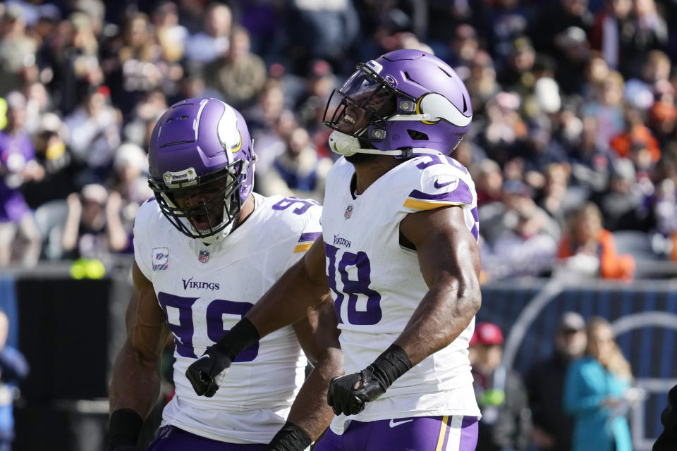 Minnesota Vikings linebacker D.J. Wonnum (98) reacts after sacking Chicago Bears quarterback Justin Fields during the first half of an NFL football game, Sunday, Oct. 15, 2023, in Chicago. (AP Photo/Nam Y. Huh)
