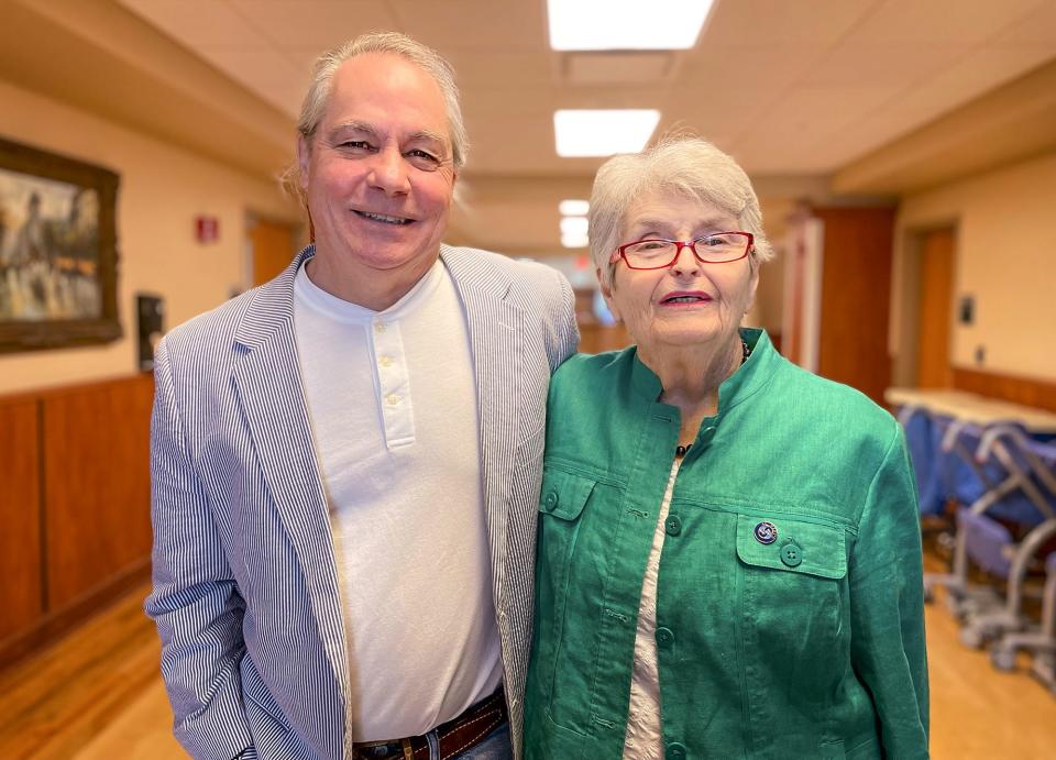(L-R) Athens musician Mark Maxwell stands with former St. Mary's Hospital Vice President Marilyn Hill on Tuesday, July 25, 2023. Hill came up with the idea for the St. Mary's lullaby and commissioned Maxwell to compose and record the music in 1992.