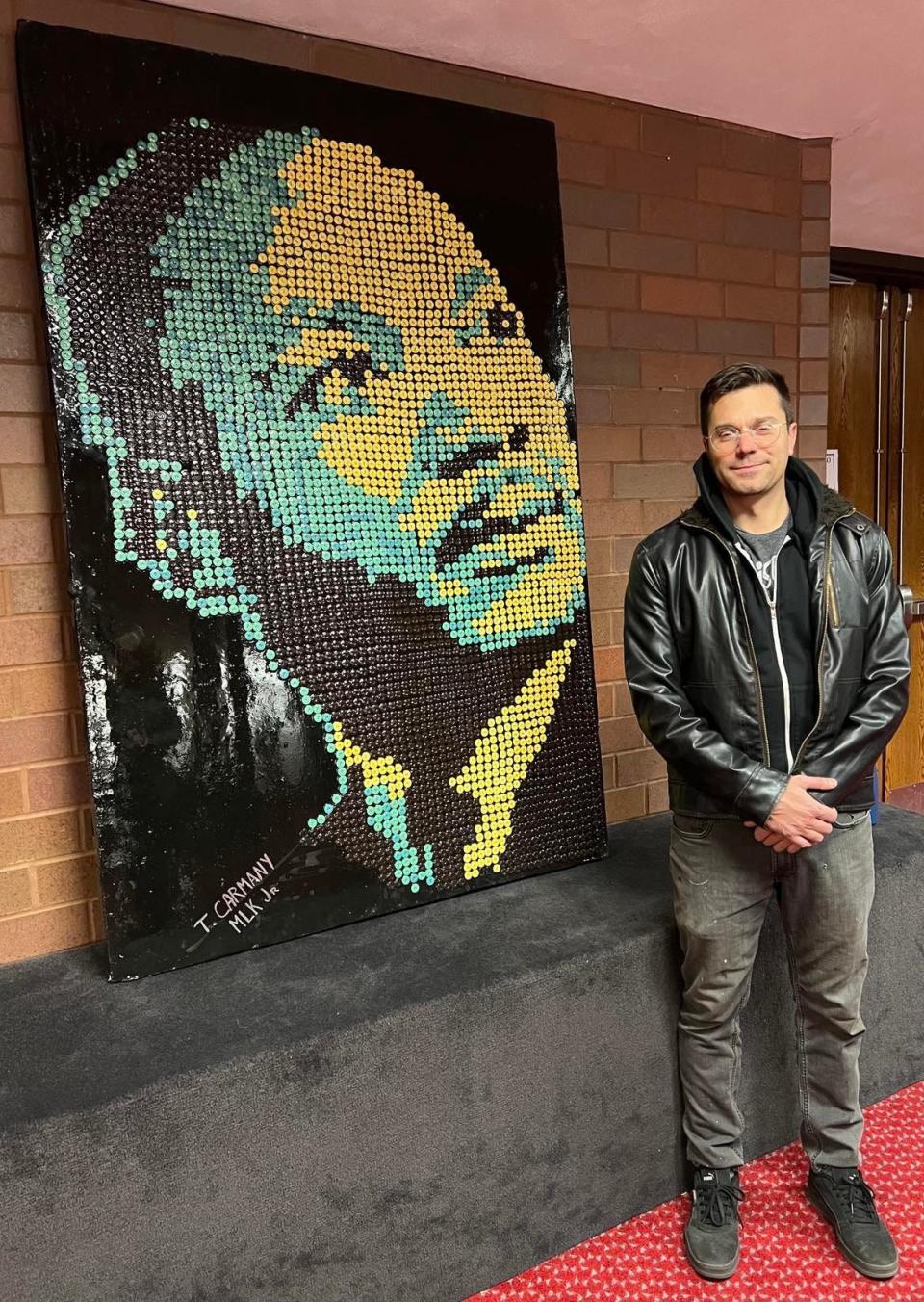 Canton artist Tim Carmany created this portrait of Martin Luther King Jr. using 1,000 buttons that were dropped off at his art studio. ArtsinStark has donated the piece to McKinley High School.