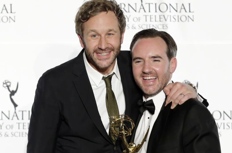 Chris O'Dowd (L) and Nick Vincent Murphy hold an International Emmy in the press room at the International Emmy Awards in New York City in 2013. File Photo by John Angelillo/UPI