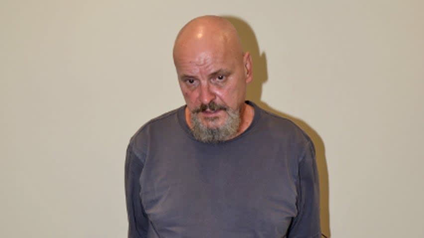 Basil Borutski stands in a room at the Pembroke OPP detachment shortly after his arrest. 