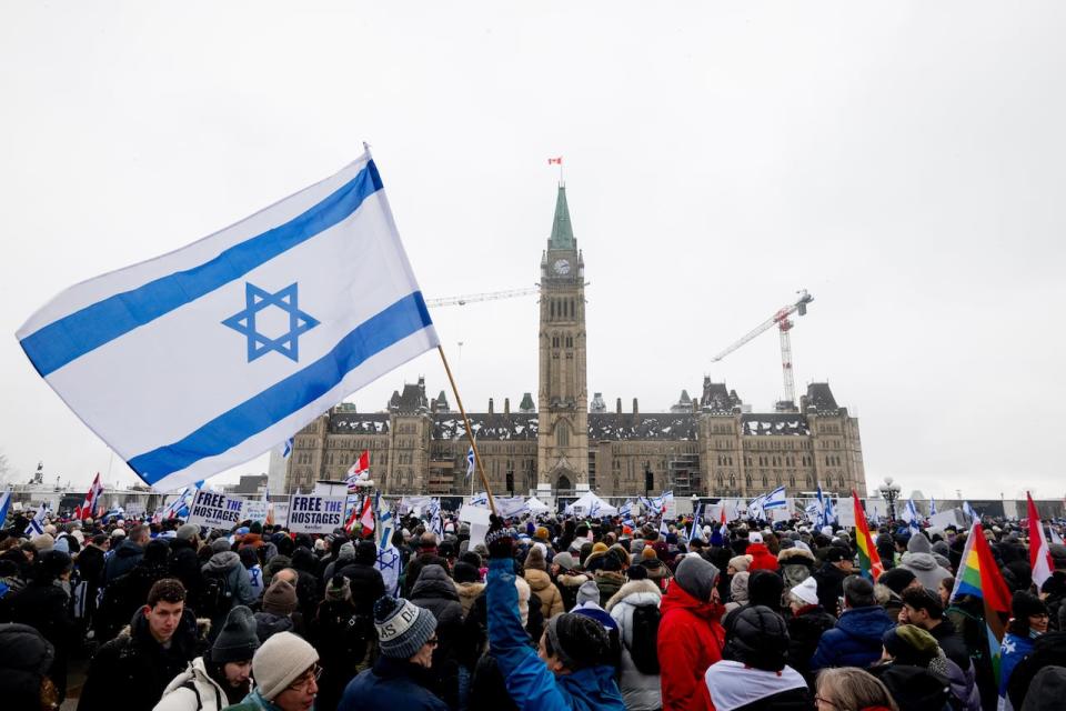 Protestors are seen on Parliament Hill during a pro-Israel protest on Parliament Hill  in Ottawa, on Monday, Dec. 4, 2023.