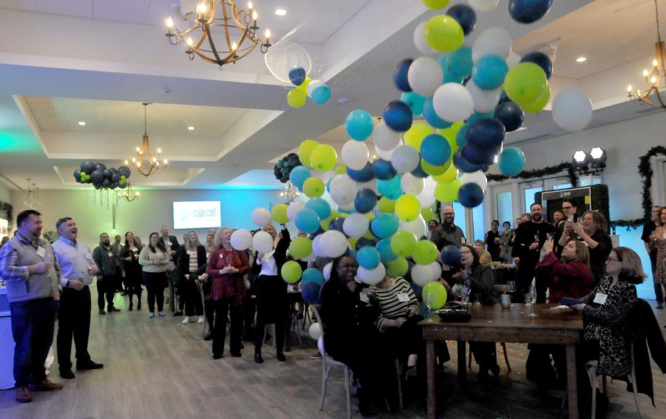 Balloons drop at the end of the speeches at the Cape Cod Chamber of Commerce's new branding reveal event Wednesday. Cape Cod Chamber of Commerce unveiled its new branding of the Cape during an event Wednesday afternoon at Pelham House Resort.