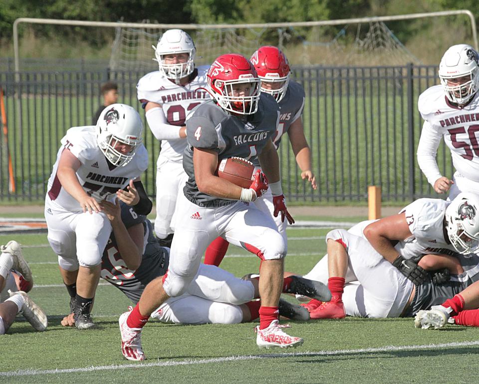 Brayden Clark finds the open field on his way for a 79-yard touchdown run against Parchment earlier this season.