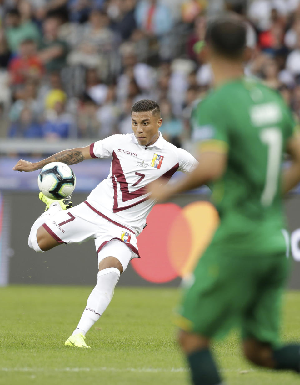 Venezuela's Darwin Machis kicks a ball during a Copa America Group A soccer match against Bolivia at Mineirao stadium in Belo Horizonte, Brazil, Saturday, June 22, 2019. (AP Photo/Eraldo Peres)