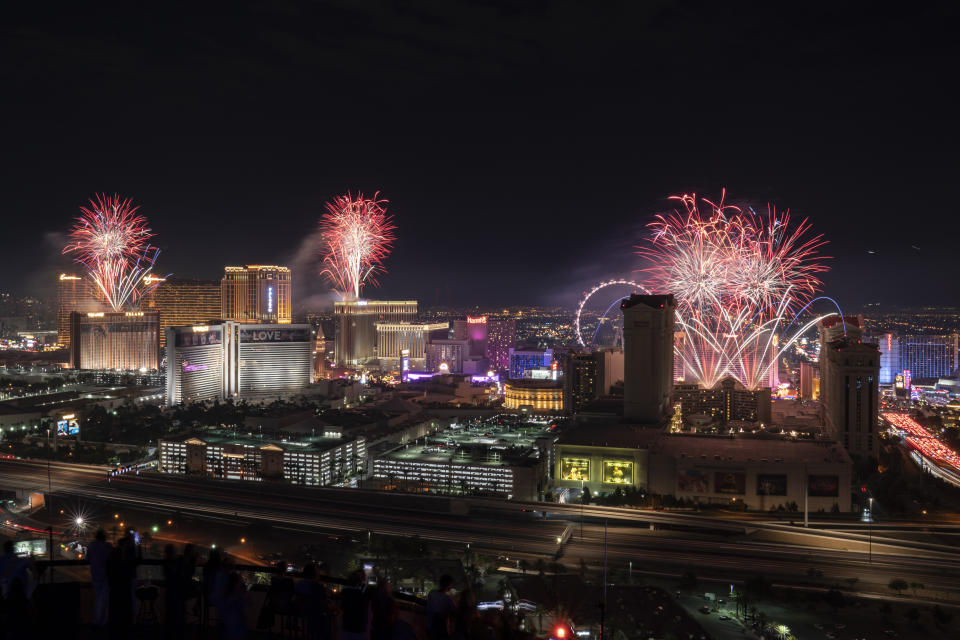 FILE - Fireworks explode over the Las Vegas Strip during a 4th of July Fireworks show, July 4, 2021, in Las Vegas. Extremely hot, dry conditions forecast through the Fourth of July across much of the West are heightening concerns about wildfires and the dangers of fireworks. (AP Photo/John Locher, File)