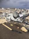 Extensive damage to homes and vehicles is pictured in the aftermath of a tornado that touched down in Washington, Illinois on November 17, 2013 in this photo courtesy of Anthony Khoury. REUTERS/Anthony Khoury/Handout via Reuters