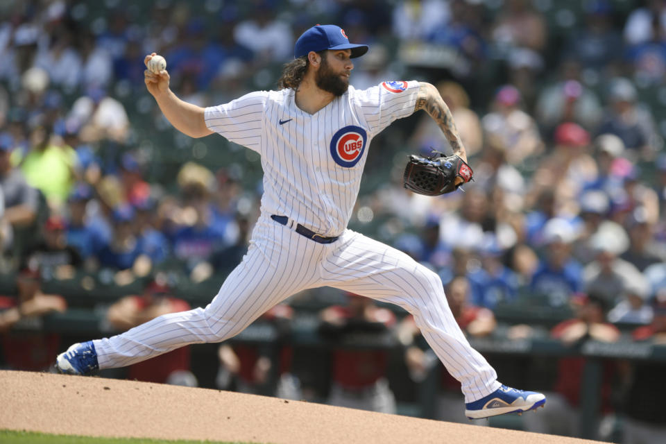 Chicago Cubs starter Trevor Williams delivers a pitch during the first inning of a baseball game against the Arizona Diamondbacks, Sunday, July 25, 2021, in Chicago. (AP Photo/Paul Beaty)