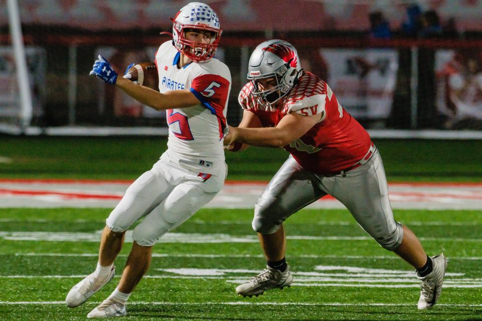 Garaway's Brady Roden looks to gain yardage on a run play during the second quarter against Sandy Valley, Friday, Oct. 14 at Sandy Valley Stadium.