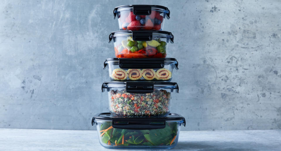 Photo shows Woolworths' glass containers with plastic lids.