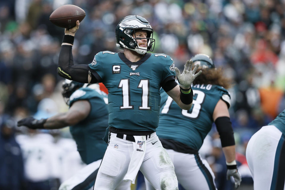 Philadelphia Eagles' Carson Wentz passes during the first half of an NFL football game against the Seattle Seahawks, Sunday, Nov. 24, 2019, in Philadelphia. (AP Photo/Michael Perez)