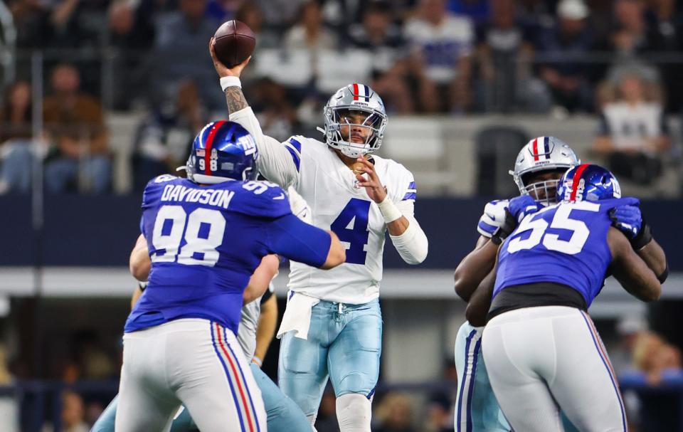 Nov 12, 2023; Arlington, Texas, USA; Dallas Cowboys quarterback Dak Prescott (4) throws during the first half against the New York Giants at AT&T Stadium. Mandatory Credit: Kevin Jairaj-USA TODAY Sports