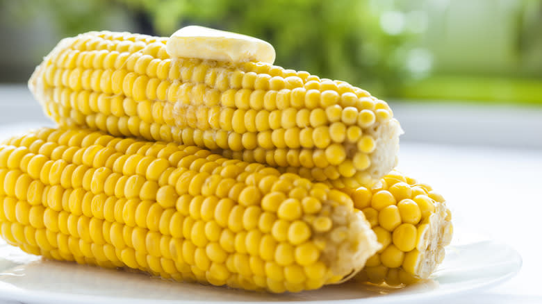 Corn cobs with butter on top