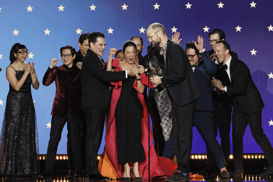 Shirley Kurata, Ke Huy Quan, Harry Shum Jr., Jonathan Wang, Michelle Yeoh, Daniel Scheinert, Daniel Kwan, Zak Stoltz, and Jon Read accept the Best Picture award for “Everything Everywhere All at Once” at the 2023 Critics Choice Awards - Credit: Kevin Winter/Getty Images for Critics Choice Association