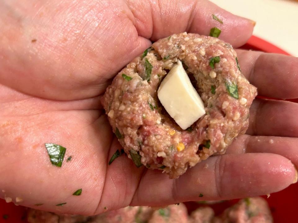 Preparing the smoked meatballs for Giada De Laurentiis' Bucatini All'Amatriciana pasta