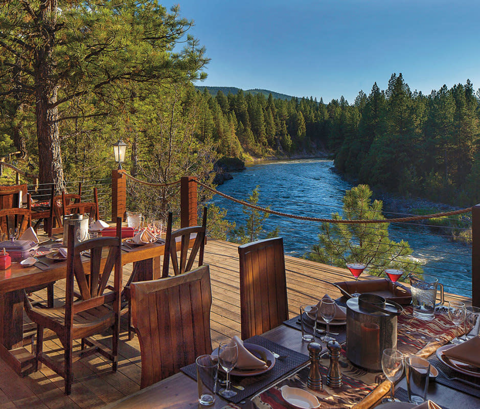 Guests can sign up for a fly fishing trip on the Blackfoot River—or grab a cup of joe from the camp kitchen, amble down to the river, and cast a line in their pajamas.<p>Stuart Thurlkill</p>