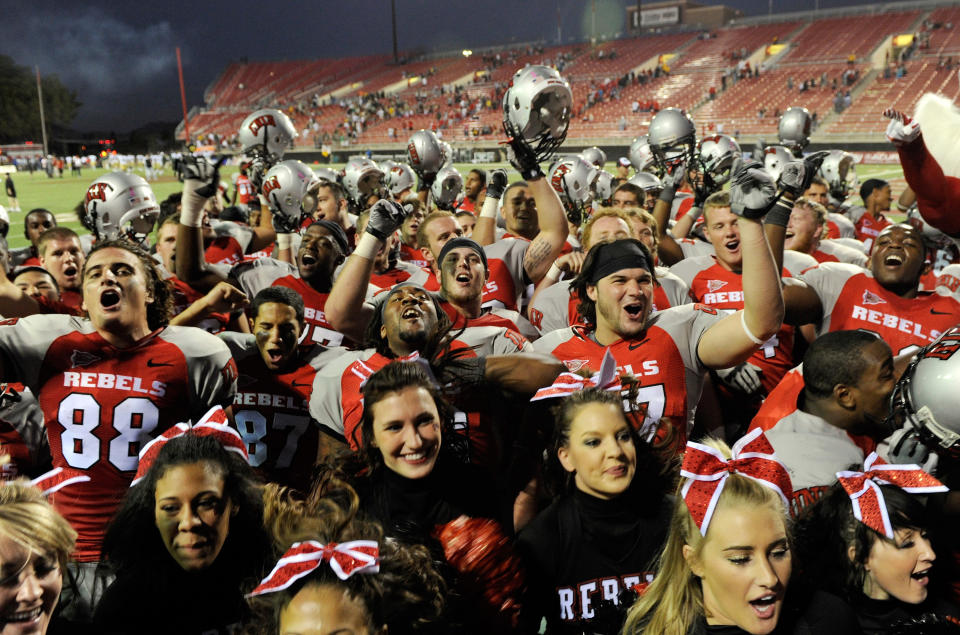 We’d be this happy for unlimited food at a football game. (Photo by Ethan Miller/Getty Images)