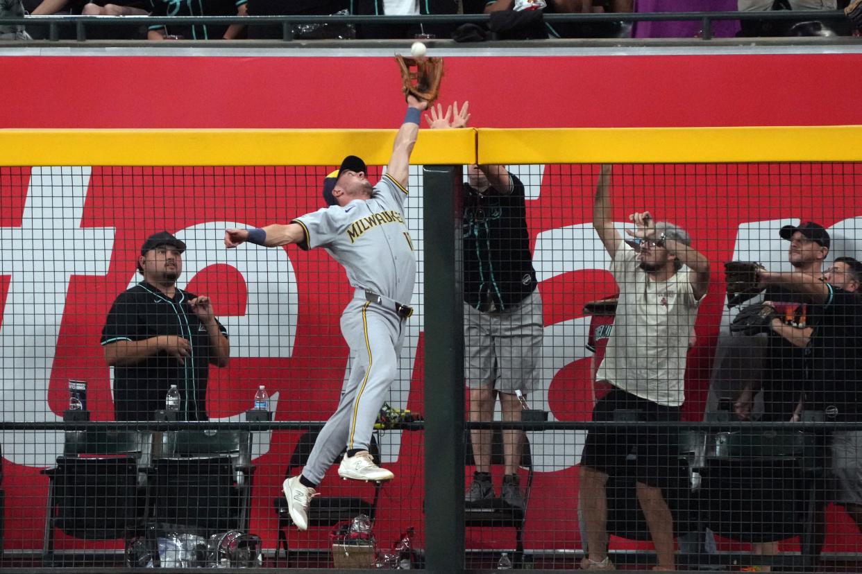 Sep 14, 2024; Phoenix, Arizona, USA; Milwaukee Brewers outfielder Sal Frelick (10) makes a catch for an out against the Arizona Diamondbacks in the first inning at Chase Field. Mandatory Credit: Rick Scuteri-Imagn Images