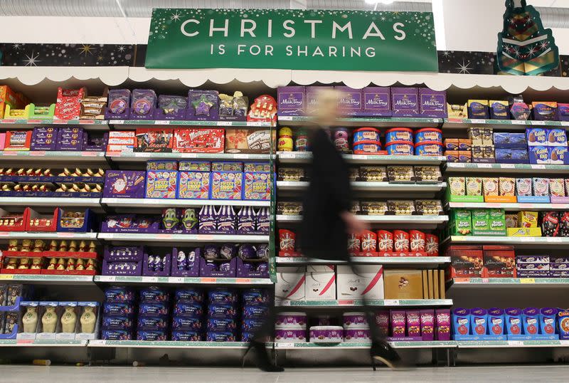 FILE PHOTO: File photograph of a woman shopping at a Sainsbury's store in London