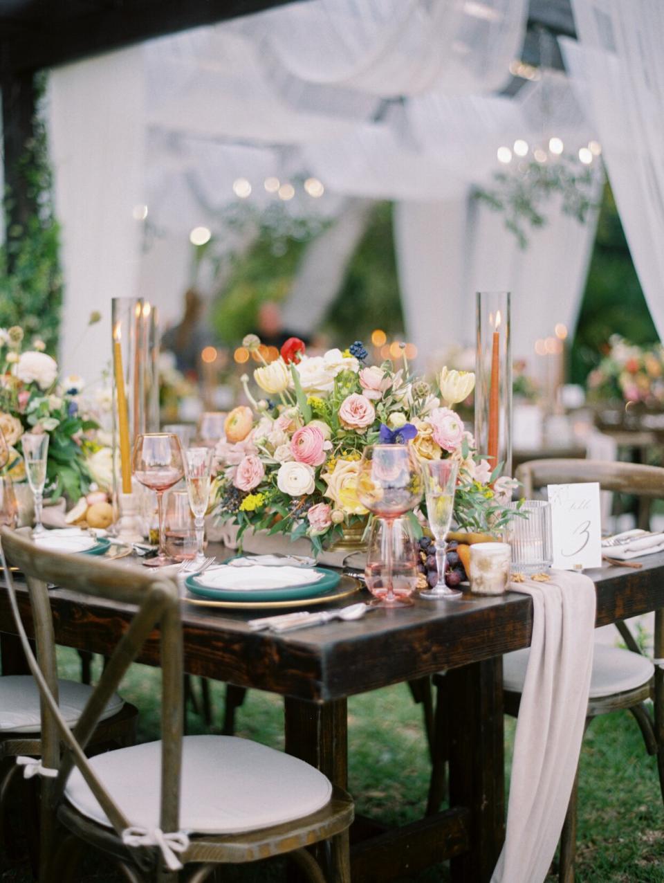 wedding reception tablescape with colorful flowers