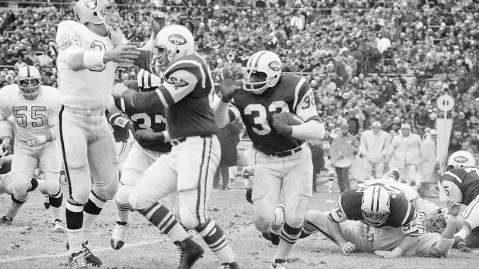 Pete Lammons, pictured here fending off Oakland Raiders' linebacker Gus Otto.