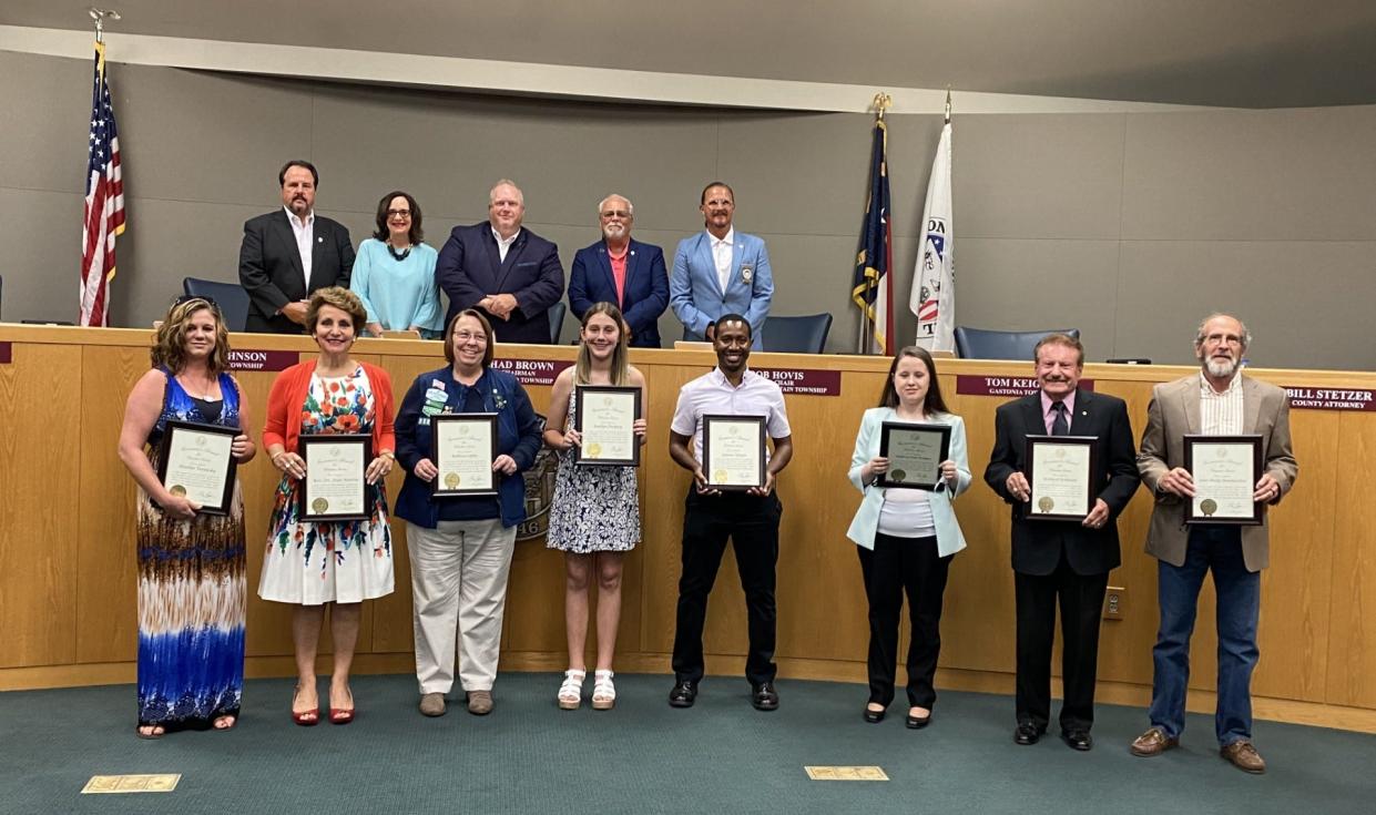 Gaston County's 2023 Governor's Volunteer Service Award winners receive their certificates at a Gaston County Commission meeting in June 2023.