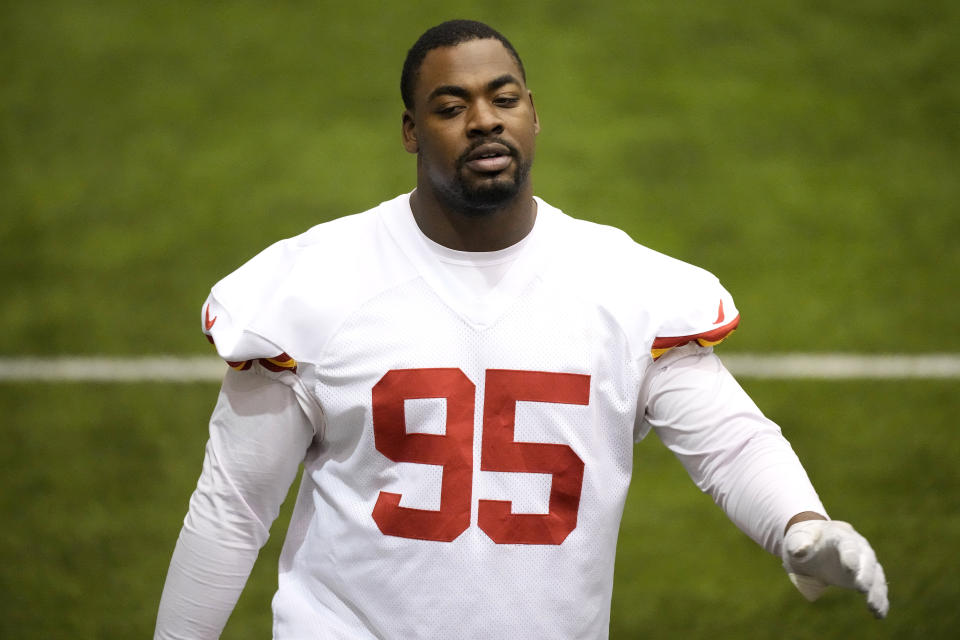 Kansas City Chiefs defensive tackle Chris Jones stretches during the NFL football team's practice Wednesday, Jan. 24, 2024, in Kansas City, Mo. (AP Photo/Charlie Riedel)