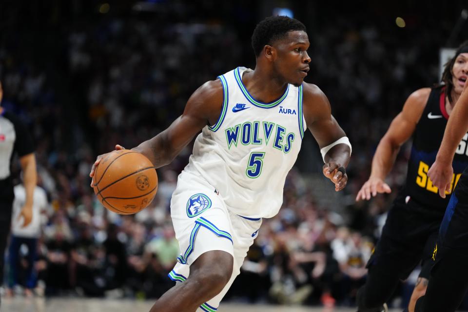 May 19, 2024; Denver, Colorado, USA; Minnesota Timberwolves guard Anthony Edwards (5) drives at the basket in the first quarter against the Denver Nuggets in game seven of the second round for the 2024 NBA playoffs at Ball Arena.