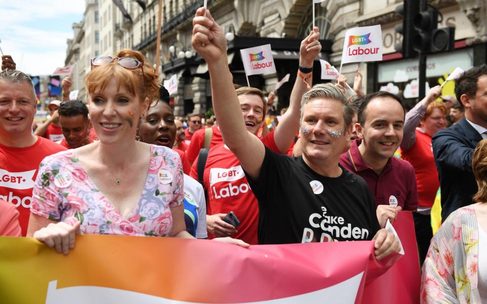 It's unclear which stance Starmer, pictured at a Pride event with Angela Rayner, takes on the trans issue