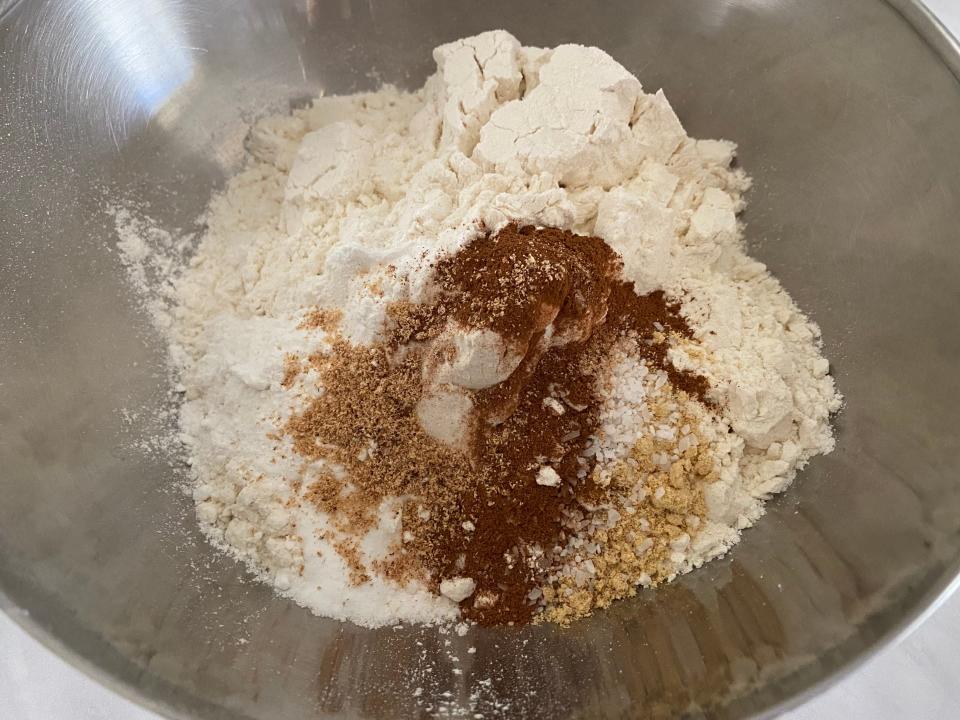 Cinnamon, nutmeg, and ginger in a bowl.