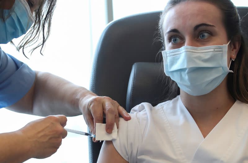 FILE PHOTO: Vaccination with Pfizer-BioNTech coronavirus disease (COVID-19) vaccine of the medical staff, in Brussels