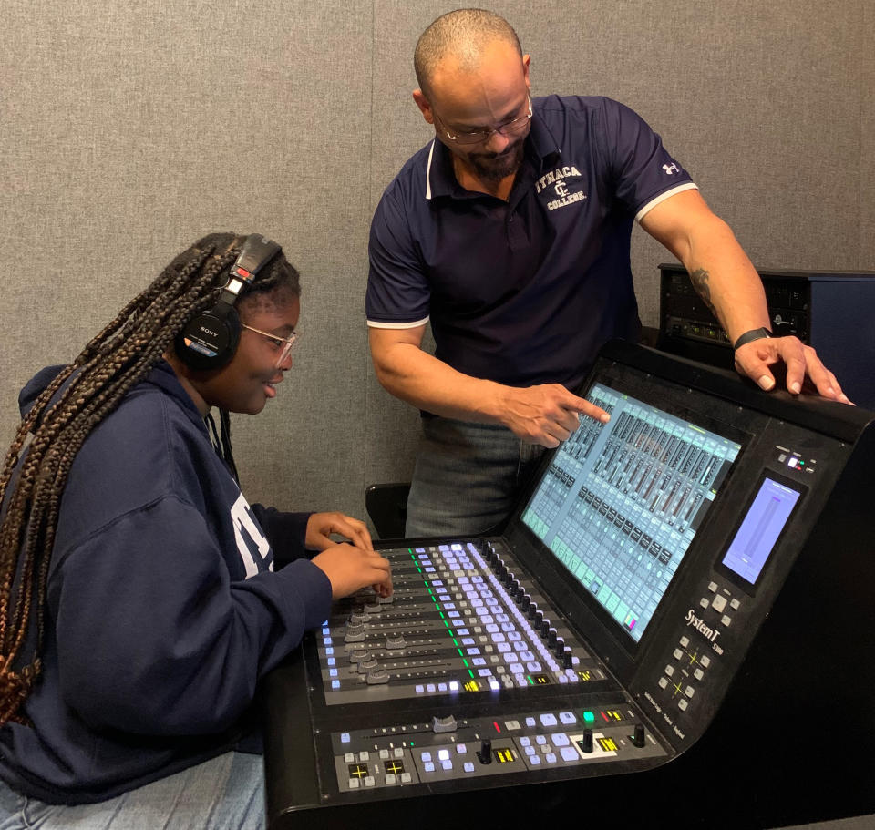 A teacher instructs an Ithaca student using SSL solutions.