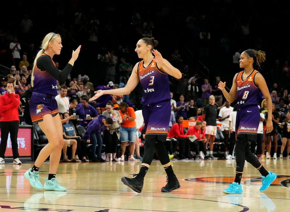 Phoenix Mercury guard Diana Taurasi (3) smiles after making a basket against the Washington Mystics in the first half at Footprint Center in Phoenix on Aug. 8, 2023.