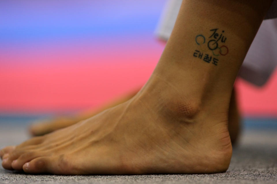 Sarah Stevenson's Olympic tattoo can be seen during Team GB Taekwondo training at the Macau Pavilion on July 31, 2008 in Macau, China. (Photo by Stu Forster/Getty Images)