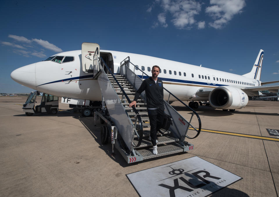 <p>Manager Gareth Southgate steps off the plane as the England Football Team return from the World Cup, Birmingham Airport. (Image: FA) </p>