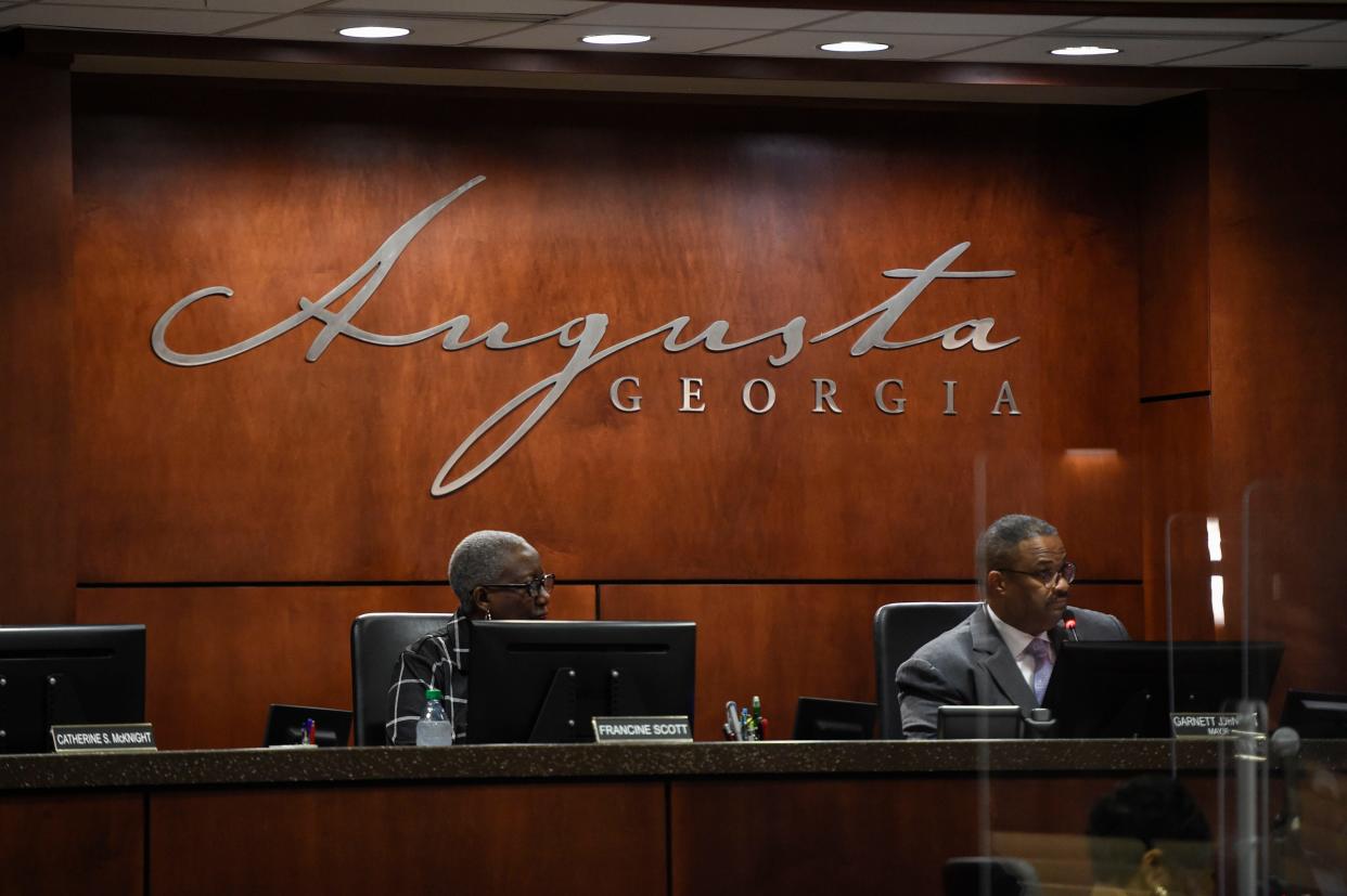 FILE - Augusta Mayor Garnett Johnson calls to order a special Commission meeting at the Augusta Richmond County Municipal building on Thursday, Feb. 9, 2023. On Tuesday, the Commission voted to approve two contracts, one with a data privacy law firm.