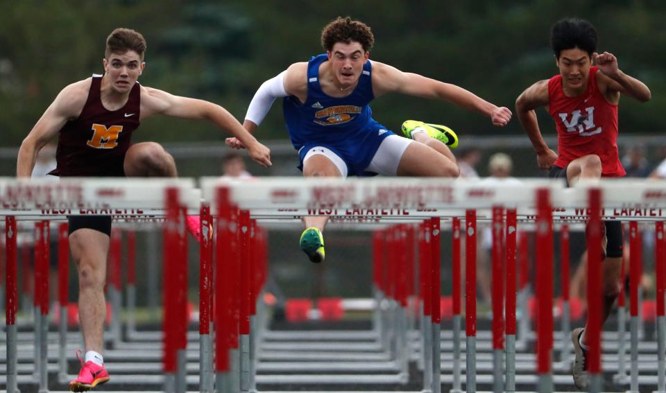 McCutcheon Matthew Hugs, Crawfordsville Alec Sadian and West Lafayette Jaden Park compete in the 110m hurdles during the IHSAA boy’s track and field sectional meet, Thursday, May 16, 2024, at West Lafayette High School in West Lafayette, Ind.