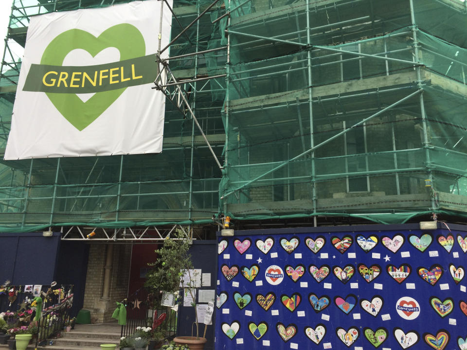 Tributes are left at Notting Hill Methodist Church, Thursday, June 14, 2018, in support of those affected by the massive fire in Grenfell Tower in London. (AP Photo/Kirsty Wigglesworth)