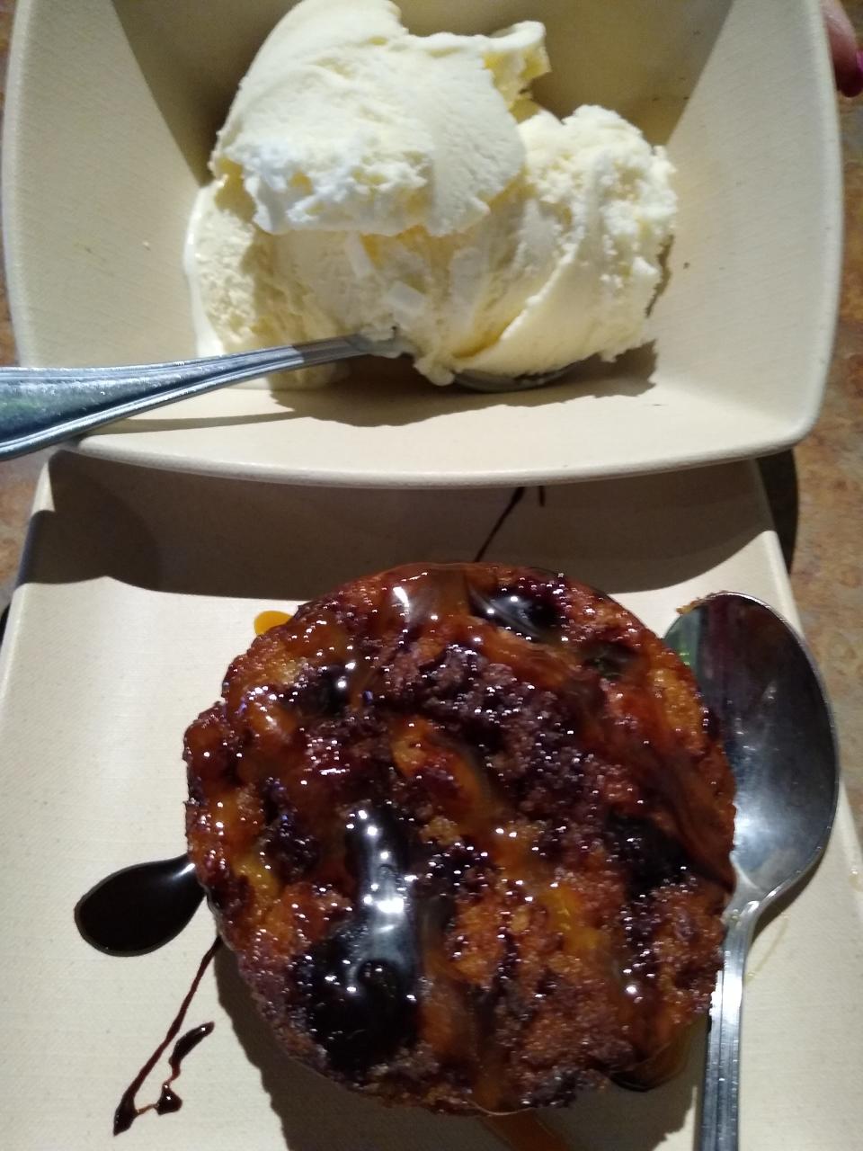 Scratch-made bread pudding and a dish of ice cream are served at Great Oaks Tavern in Wadsworth.